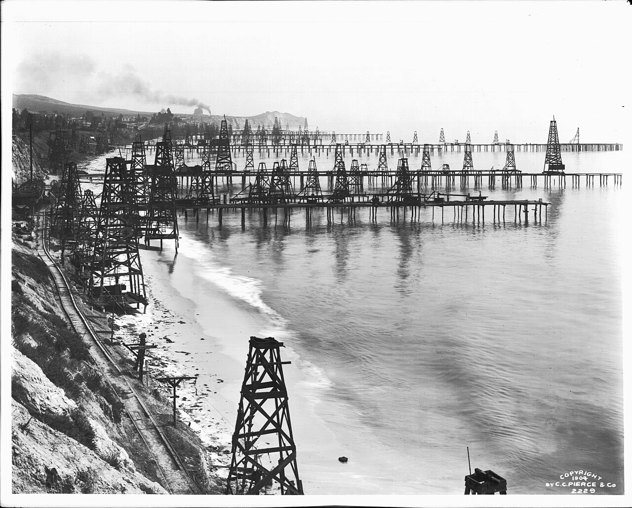 Oil derricks on piers off Summerland beach in 1904